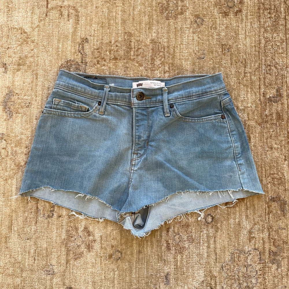 Levi’s Perfectly Slimming 512 bootcut jean cutoffs size S.